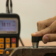 Inspection thickness cast iron by ultrasonic thickness test for found internal defect. UTM