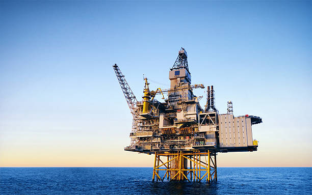 offshore oil rig on a clear day with smooth water