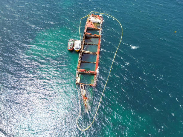 Partially sunken cargo ship